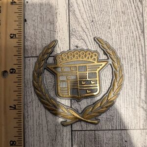 Cadillac Luxury Gold and Silver Car Emblem